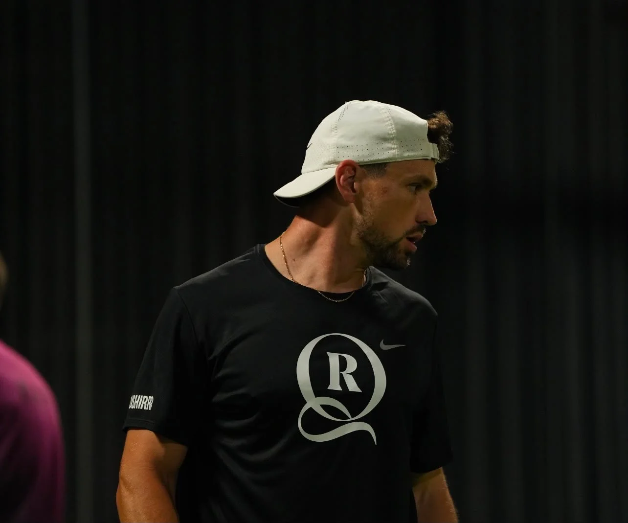 Vuk Velickovic coaching in Racquet Club training kit